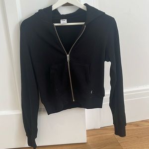 Aritzia TNA black waffle zip up sweatshirt in black. Size S